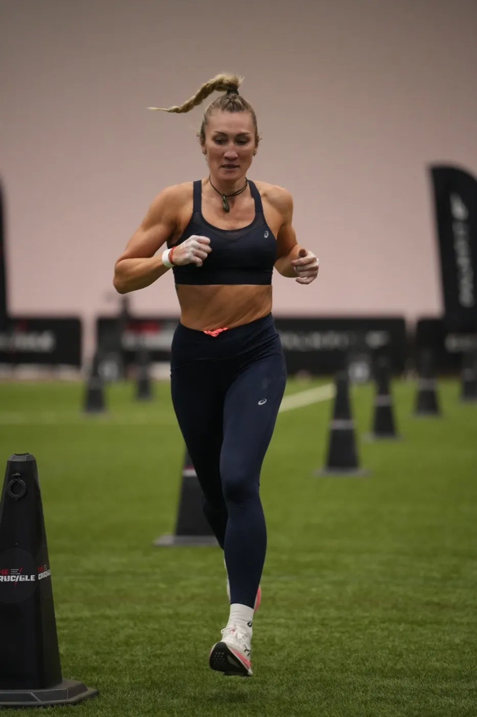 Olga coaching a client in strength training